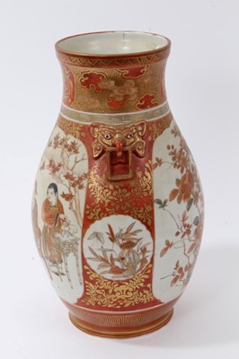 Lot 98 - Late 19th century Japanese Kutani vase, of baluster form with beast mask handles, painted with figures, birds and flowers, 27.5cm height