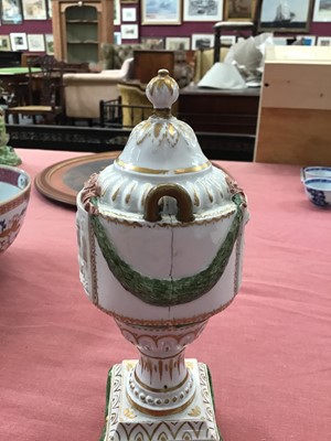 Lot 102 - Unusual late 18th century Hochst porcelain urn, painted in enamels and gilt with swags and foliate patterns, with two biscuit panels of classical figures