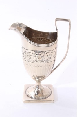 Lot 343 - Regency silver milk jug of helmet form