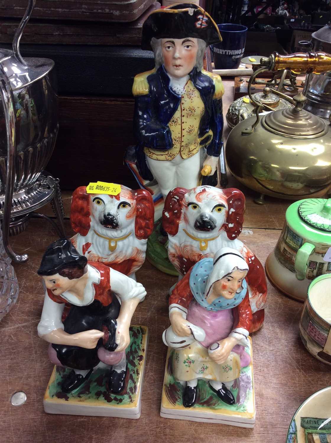 Lot 43 - Staffordshire Toby jug in form of Nelson, pair spaniels, Darby and Joan figures