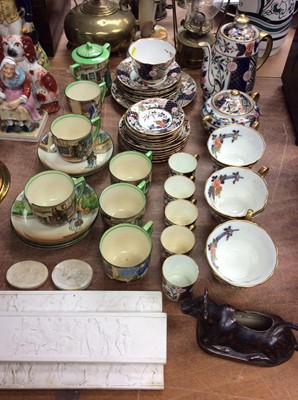 Lot 316 - Group of Imari teaware, Royal Doulton Dickens Ware, cow creamers and plaster plaques