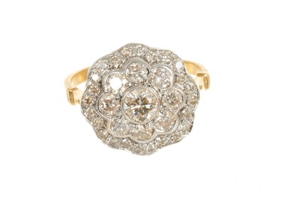 Lot 429 - Diamond cluster ring with a flower head cluster of brilliant cut diamonds in grain and rub-over setting with pierced gallery on 18ct gold shank. Estimated total diamond weight approximately 1.70 ca...