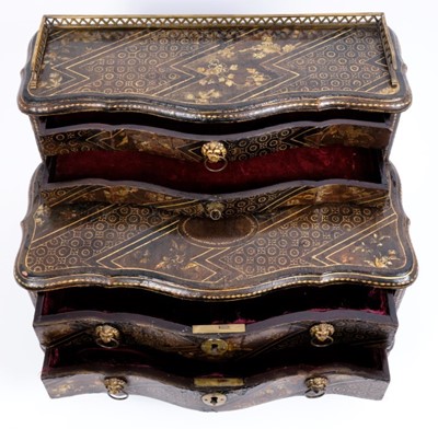 Lot 1241 - An early 19th century chinoiserie lacquer table cabinet