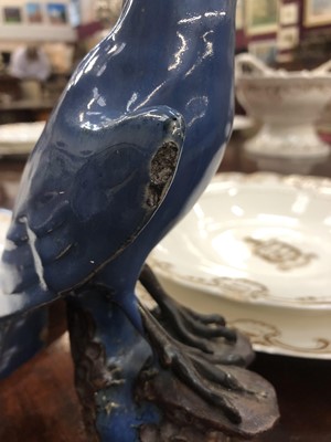 Lot 104 - Pair of Chinese Pottery Parrots with blue glazed decoration