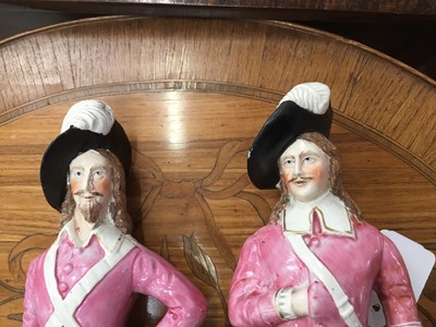 Lot 105 - Rare pair of Victorian Staffordshire pottery figures of Charles I and Prince Rupert, both wearing plumed hat, doublet and breeches, the tallest measuring 25.5cm height