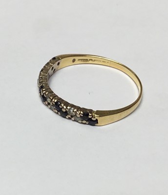 Lot 156 - Sapphire and diamond half eternity ring in 18ct gold setting