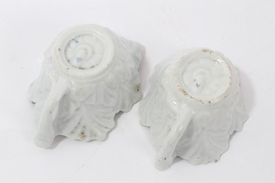 Lot 188 - Pair of Worcester butter boats, circa 1760, decorated in the Mansfield pattern, workman's marks, 8cm across