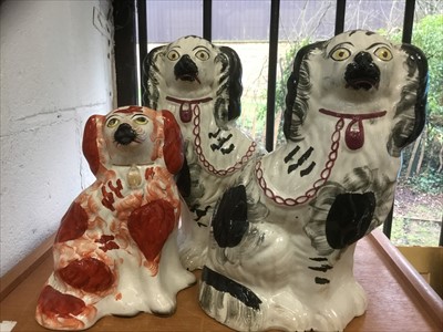 Lot 131 - Pair of Staffordshire spaniels and one other