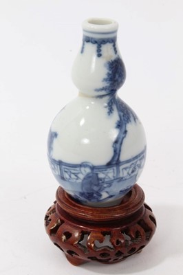 Lot 118 - Chinese miniature blue and white vase of gourd form on stand