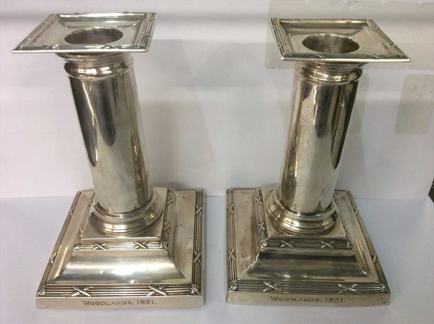 Lot 657 - Pair of silver dwarf candlesticks