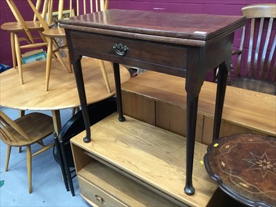 Lot 877 - Georgian mahogany tea table with fold over top, drawer on taper legs and pad feet