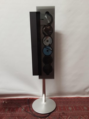 Lot 1878 - Bang and Olufsen Beosound six disc CD player with floor stand and remote control