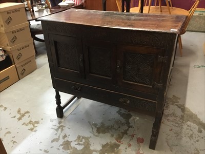 Lot 878 - 17th century and later oak cupboard with carved decoration