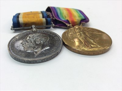 Lot 97 - First World War pair comprising War and Victory medals named to 62947 Pte. A. W. G. Stone. M.G.C.