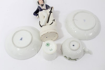 Lot 141 - Two mid 18th century Meissen saucers, a teacup, a Coalport Naval eggcup and a Staffordshire figure