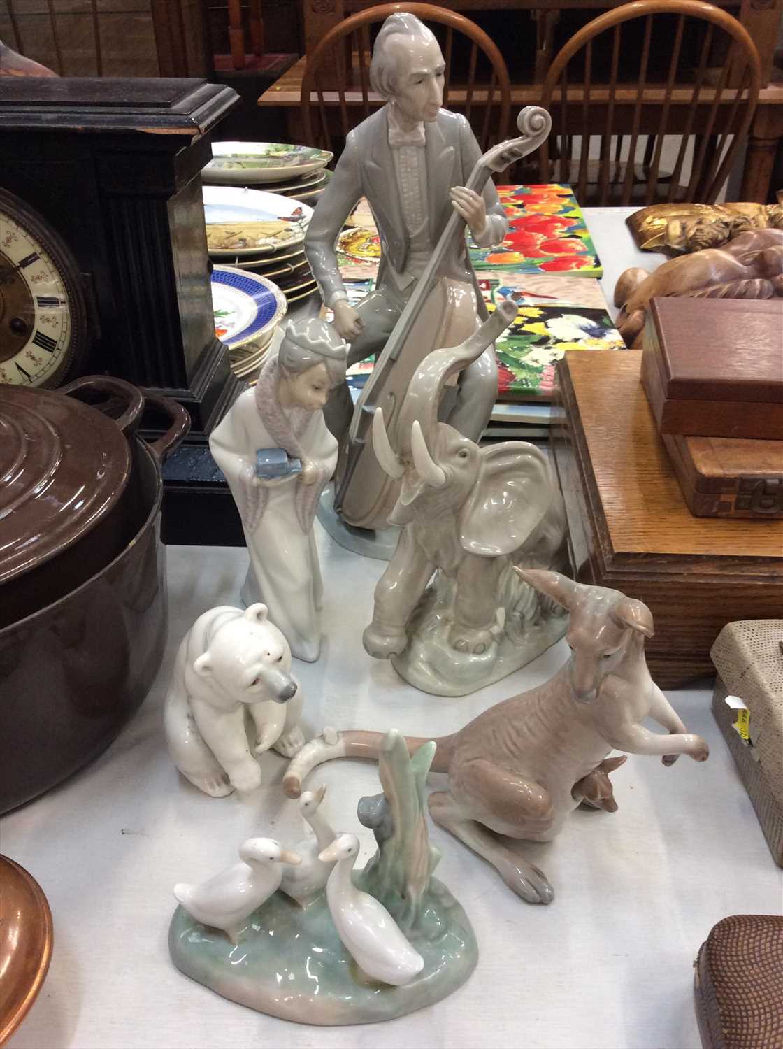 Lot 449 - Four Lladro and two Nao ornaments