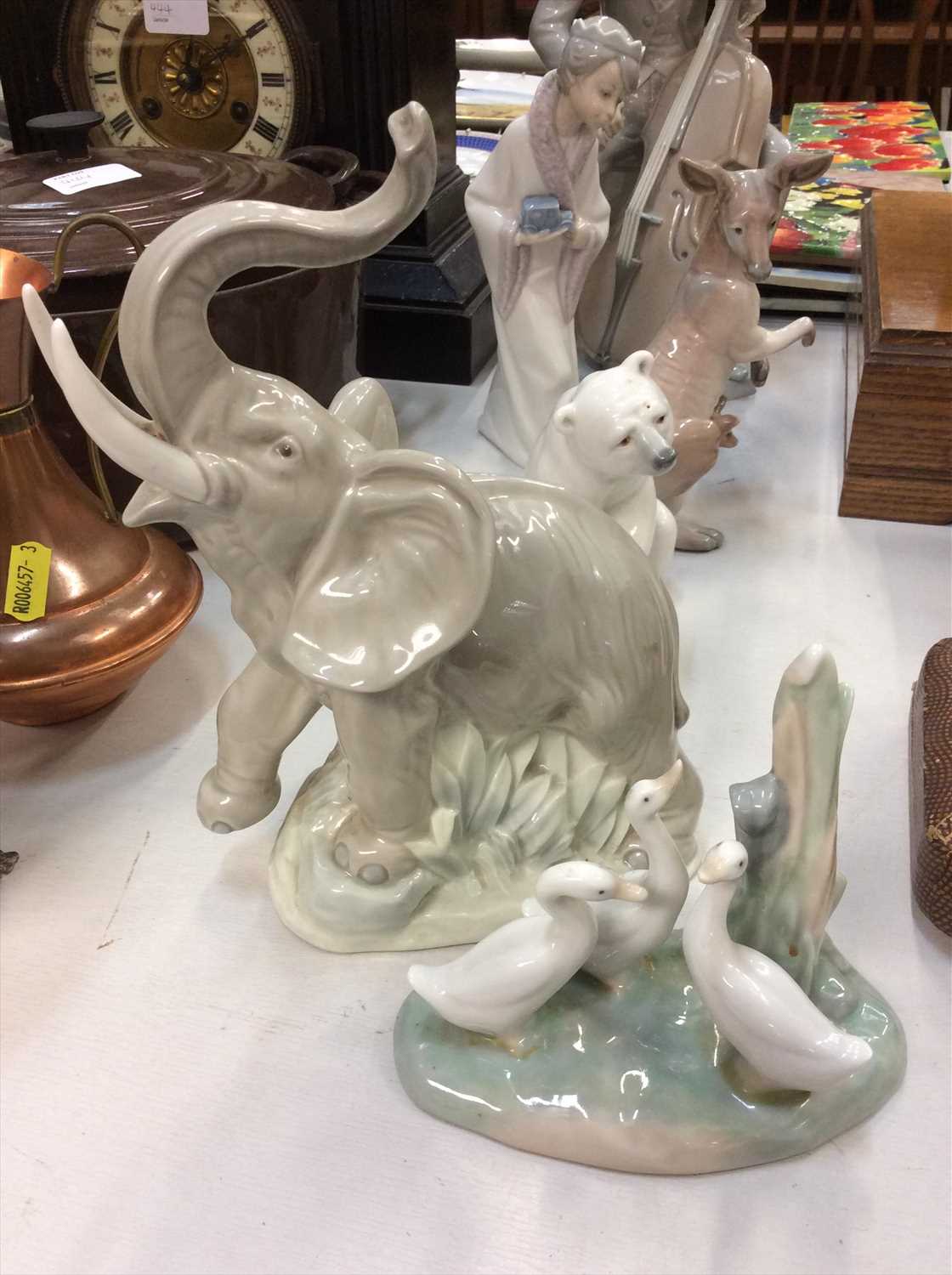 Lot 449 Four Lladro and two Nao ornaments