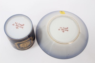 Lot 125 - Two 19th century Sèvres-style cabinet cups and saucers with Napoleon I motifs, together with a Sevres style dish