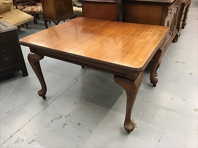 Lot 890 - Edwardian walnut extending dining table with two extra leaves on cabriole legs