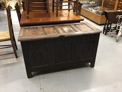 Lot 892 - Early 18th century oak panelled coffer with carved decoration