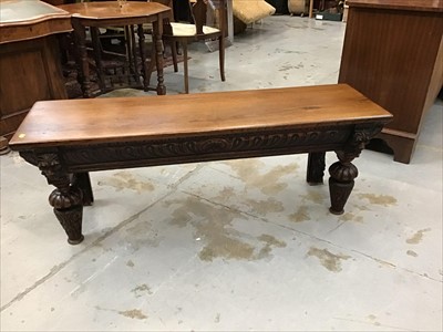 Lot 928 - Carved oak hall bench