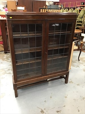 Lot 914 - 1920's Oak book case enclosed by two leaded glass doors, by G.W. Hicks & Sons Ltd 'Makers