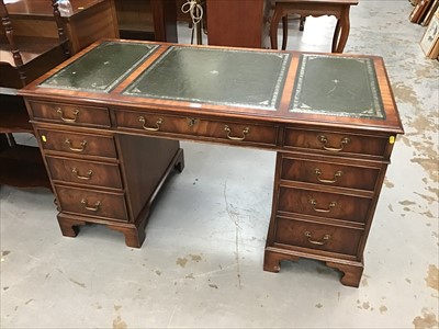 Lot 904 - Reproduction twin pedestal desk with rectangular top, leather lined