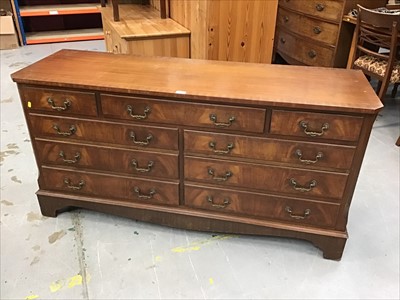 Lot 903 - Reproduction mahogany sideboard with an arrangement of nine drawers