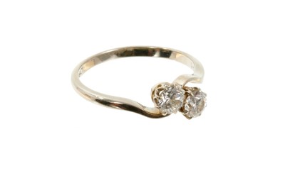 Lot 409 - Two stone diamond crossover ring