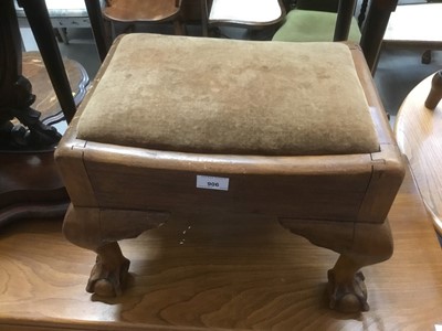 Lot 906 - A rectangular footstool with upholstered top, on carved claw and ball feet