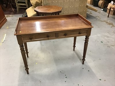 Lot 909 - Victorian mahogany writing table with two drawers on turned legs