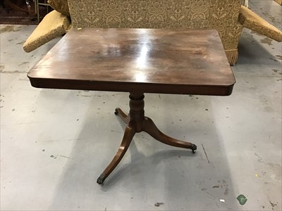 Lot 911 - Antique mahogany tilt top table on turned column and splayed legs