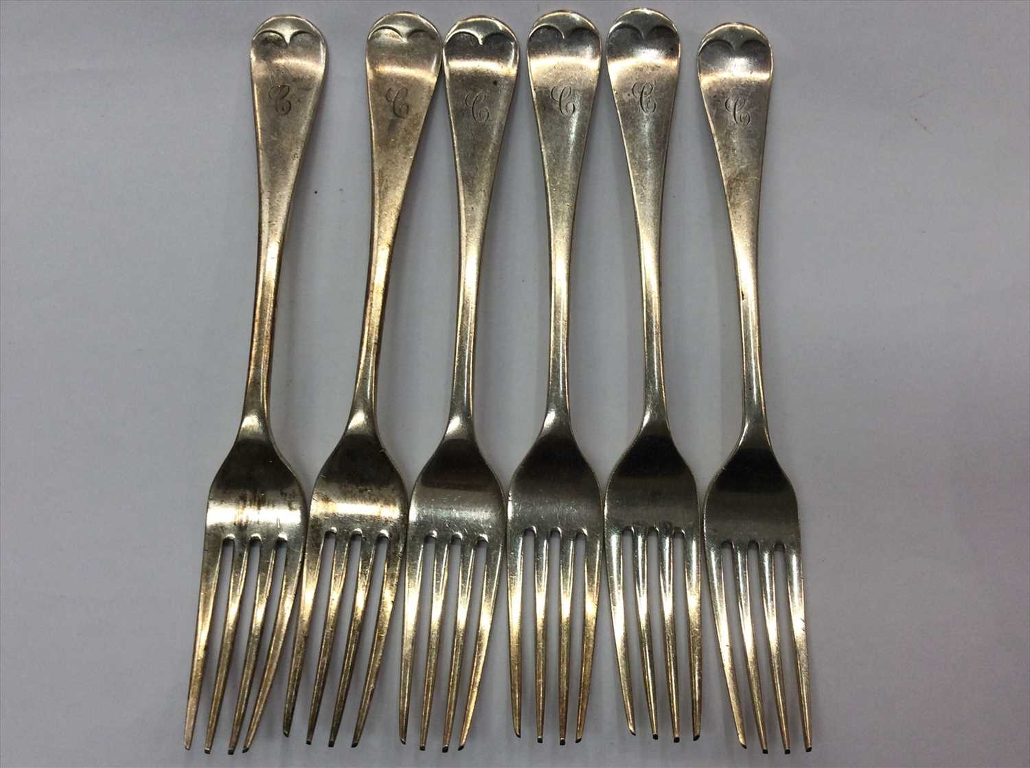 Lot 676 - Set of six silver dessert forks