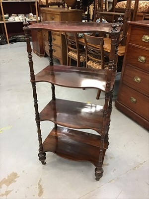 Lot 916 - Victorian rosewood serpentine fronted four tier whatnot