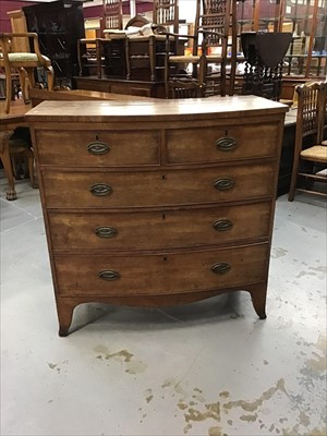 Lot 919 - Georgian mahogany bowfront chest of two short and three long graduated drawers