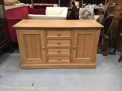 Lot 932 - Pine sideboard with four central drawers flanked by two cupboard doors