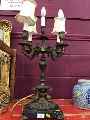 Lot 535 - Classical style lamp with four branches on marble base