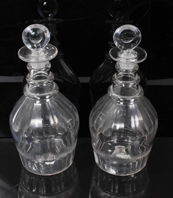 Lot 186 - Pair of Georgian ring neck decanters with target stoppers (2)