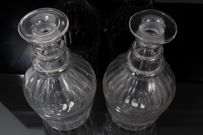 Lot 186 - Pair of Georgian ring neck decanters with target stoppers (2)