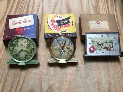 Lot 326 - Three vintage Smiths clocks to include ‘Circus’ alarm clock, cowboy and country side scene, all boxed