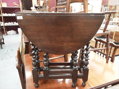 Lot 943 - 1920's oak drop leaf table on spiral twist legs