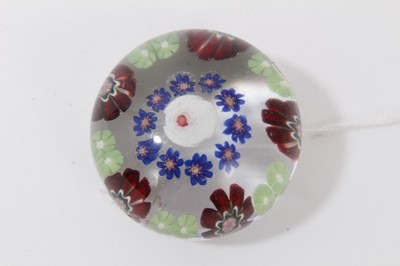 Lot 116 - Fine 19th century French glass paperweight with central white and red rose with floral border, 4.5cm