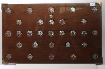 Lot 663 - Collection of 30 Fire Brigade badges mounted in folding coffee table with glazed top