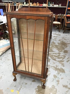 Lot 959 - Walnut display cabinet with glass shelves enclosed by glazed door