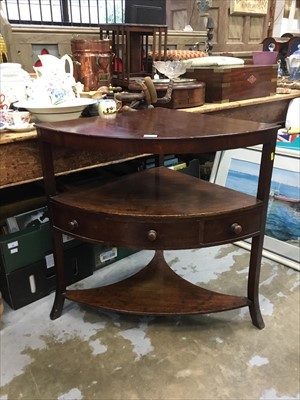 Lot 1017 - George III mahogany three tier corner washstand