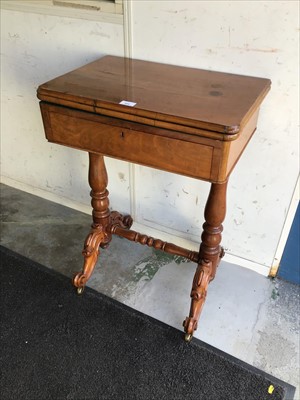 Lot 986 - Victorian walnut table with fold over revolving top