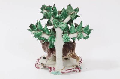 Lot 152 - Group of 19th century continental blanc de chine porcelain figures, including a pair of Nymphenburg cherubs on plinths, a cooper, a cherub-form spill vase, and one other (5)
