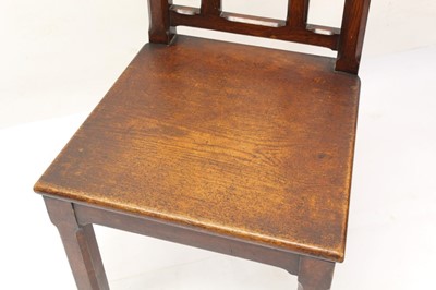 Lot 1217 - Victorian gothic oak hall chair stamped Holland & Sons