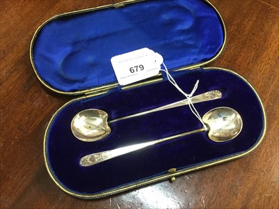 Lot 679 - Pair of silver preserve spoons in fitted case