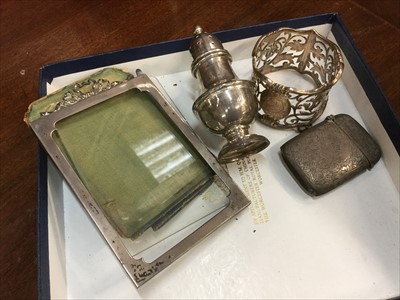 Lot 682 - Silver photograph frame, silver napkin ring, pepperette  and Vesta case